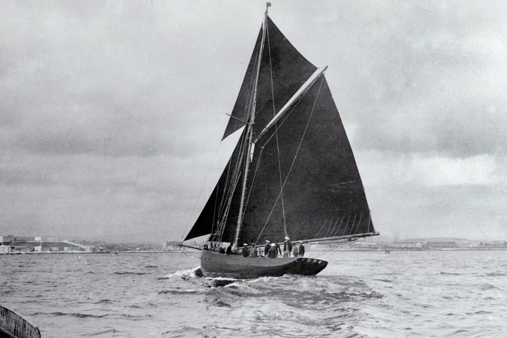 The yacht Jolie Brise seen here entering Plymouth Sound to cross the finishing line of the Cpwes Fastnet Plymouth race June 1930