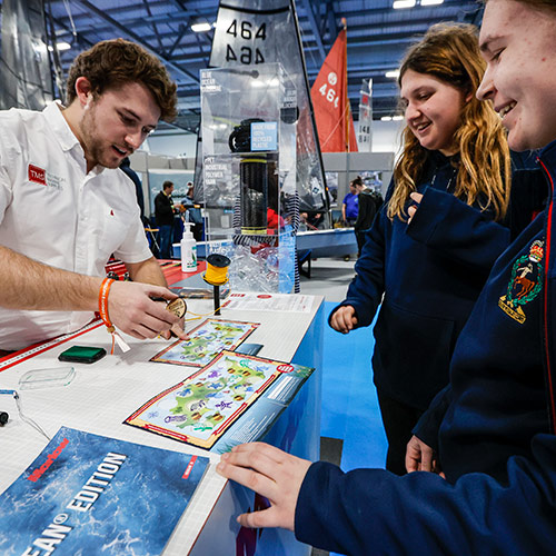 mid shots of exhibitioners at the dinghy show 2021