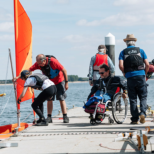 people having fun sailing examples