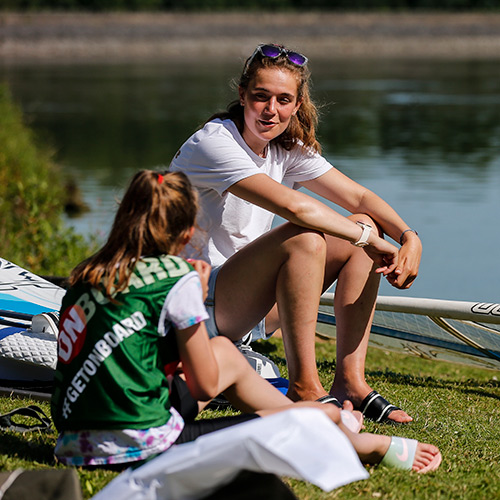 Mid shot of children enjoying sailing