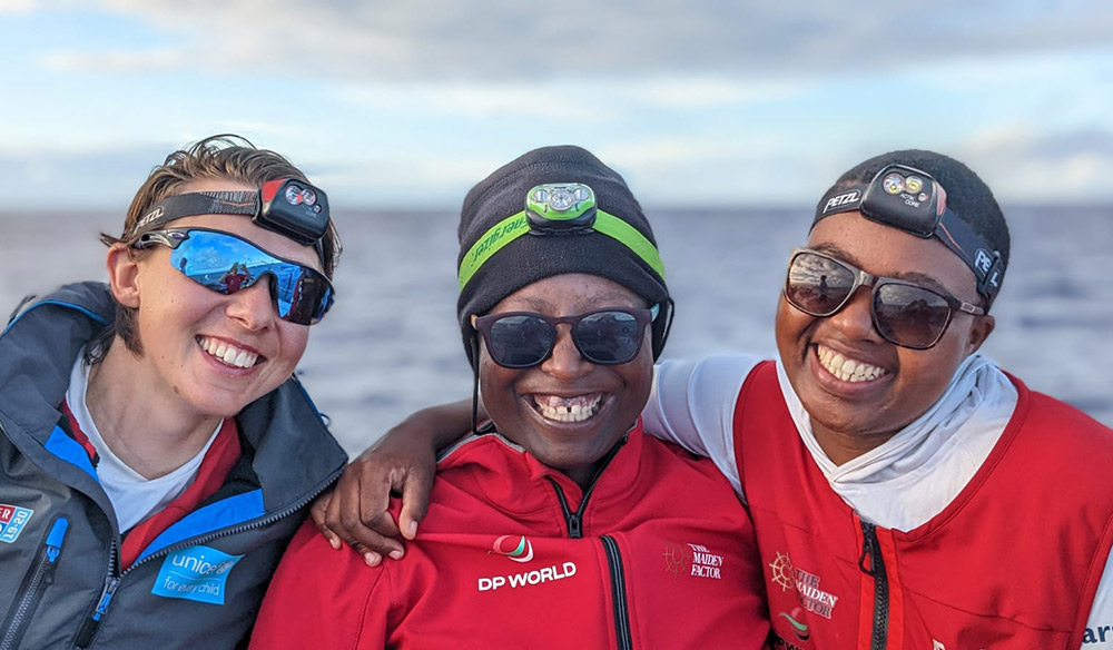 Smiling women with two children who are also smiling