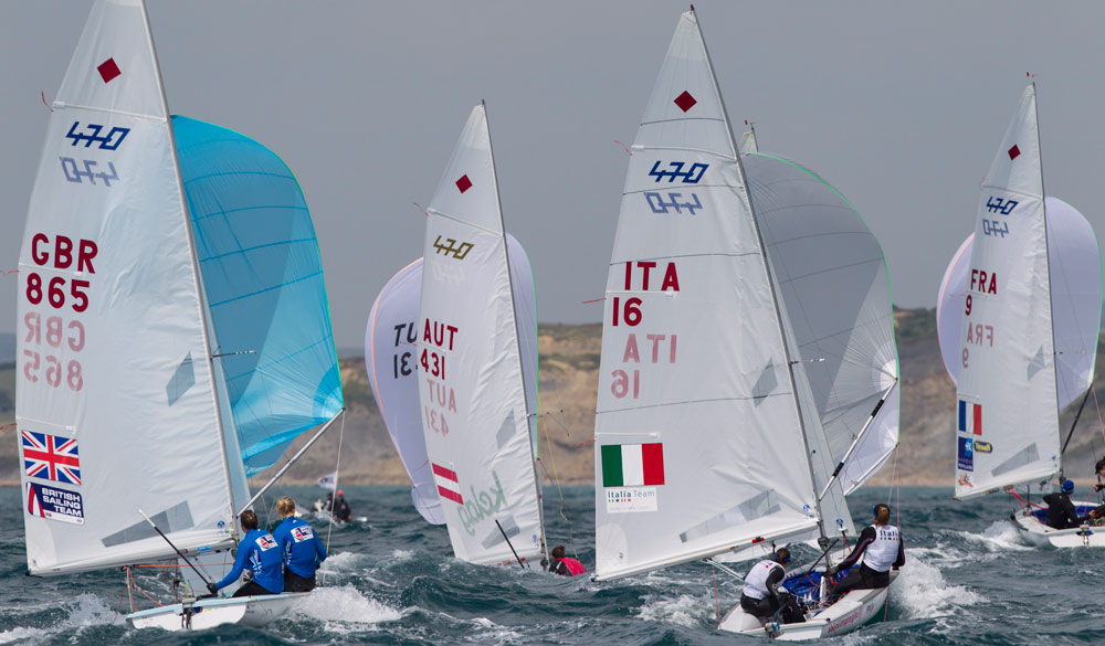 wide shot of Amy taking part in international women doubles sailing race