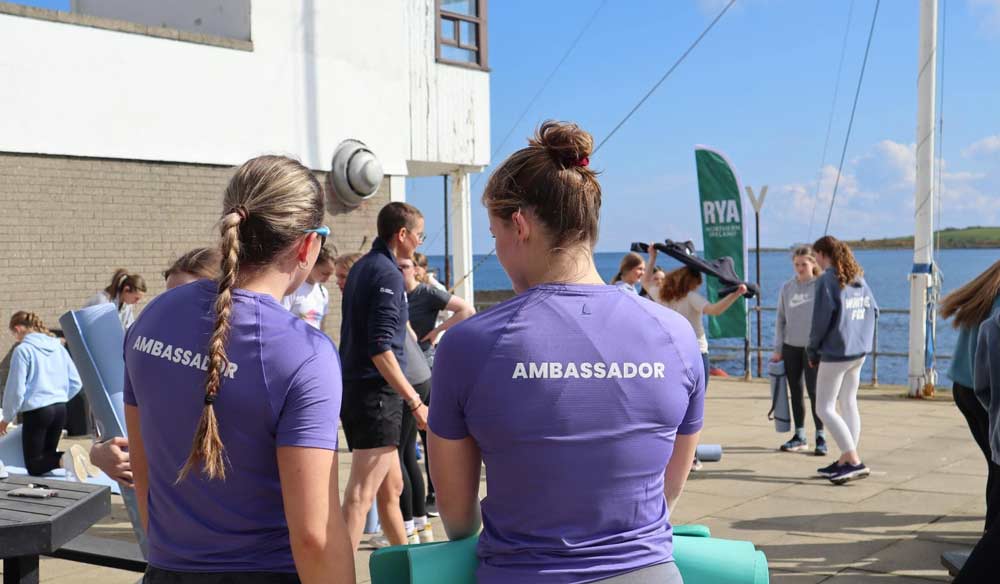 two sailing ambassadors outside of Ballyholme sailing club