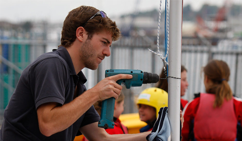 Man fixing a boat