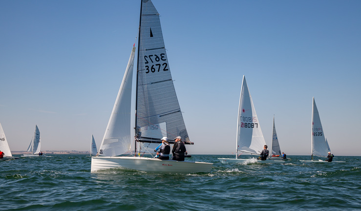 Dinghy sailors racing